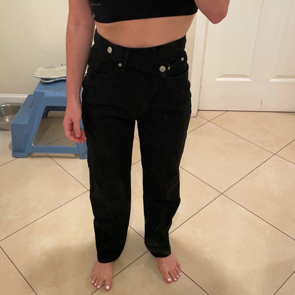 Black asymmetrical jeans